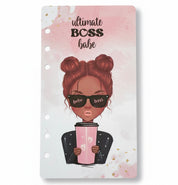 Notebook with illustration of a woman wearing sunglasses and holding a coffee cup, with 'ultimate boss babe' text.