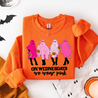 Orange sweatshirt with ghost design and text on a white background