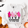White sweatshirt with pink ghosts and text 'On Wednesdays we wear pink' on a white background.